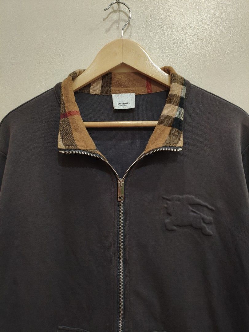 Burberry Brown/Gray Double-Zip Jacket (Category: Coats, Jackets and Outerwear) located in Mandaluyong City. Submitted by frivsthriftsph (Listing ID 1468450341, Image 3). Description: Burberry Brown/Gray Double-Zip Jacket Lightly used condition. Color rate is 8/10. Size 3XL on tag. Actual dimes are 24W by 29L. No other issue aside from sunfade (see 6th and 7th photo for reference)..