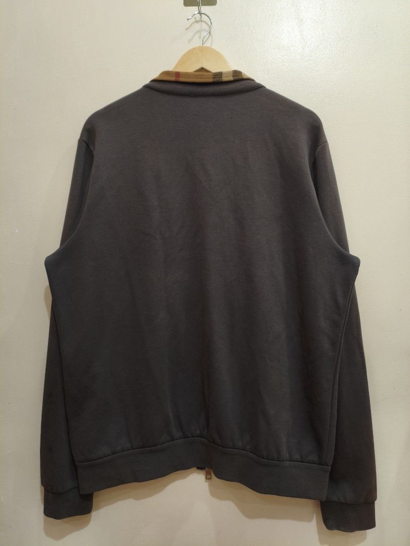 Burberry Brown/Gray Double-Zip Jacket (Category: Coats, Jackets and Outerwear) located in Mandaluyong City. Submitted by frivsthriftsph (Listing ID 1468450341, Image 2). Description: Burberry Brown/Gray Double-Zip Jacket Lightly used condition. Color rate is 8/10. Size 3XL on tag. Actual dimes are 24W by 29L. No other issue aside from sunfade (see 6th and 7th photo for reference)..