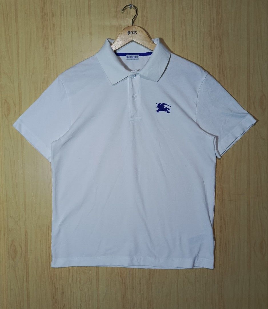 Burberry (EKD) (Category: Tshirts & Polo Shirts ) located in Andop. Submitted by loots.ni.ken (Listing ID 1468389375, Image 1). Description: Bur berry (EKD) 🔥 Dimes: W-21 L-27 Good as new Color rate: 10 No issue DM 📥.