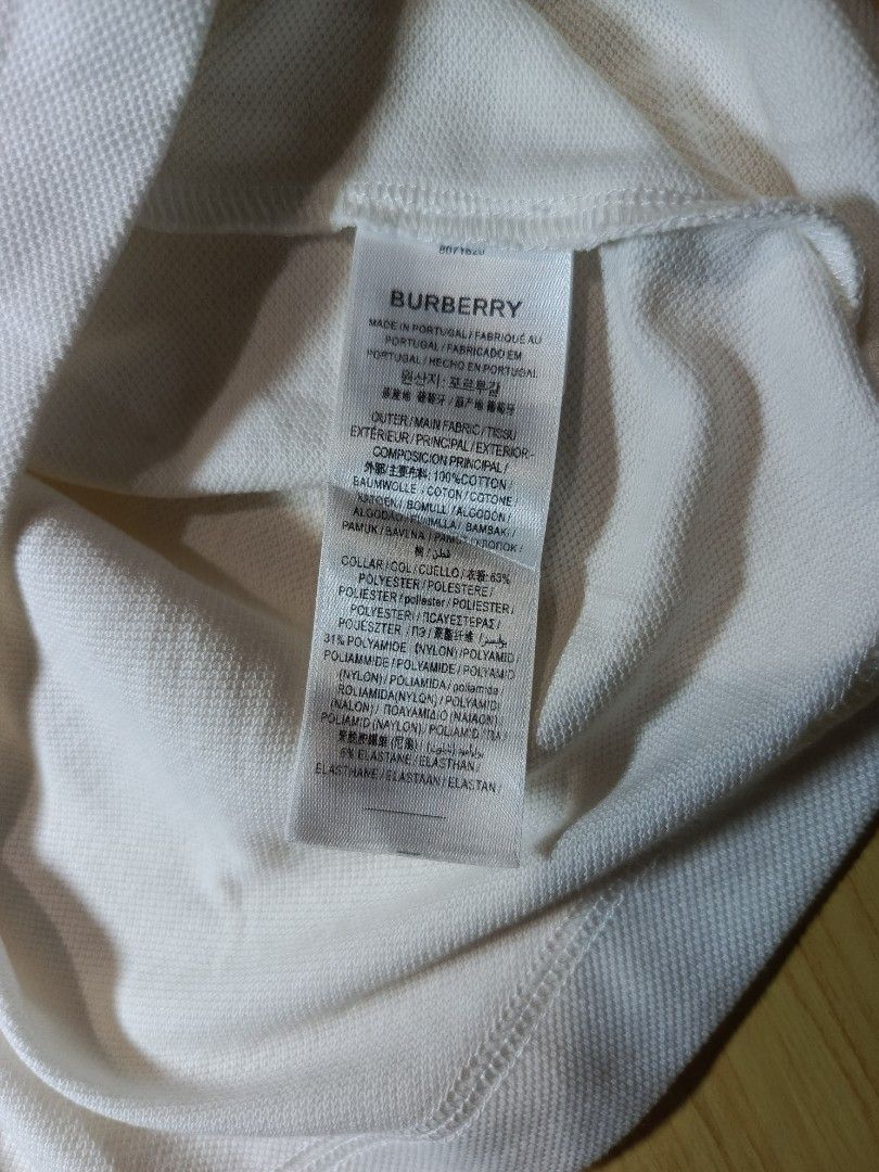 Burberry (EKD) (Category: Tshirts & Polo Shirts ) located in Andop. Submitted by loots.ni.ken (Listing ID 1468389375, Image 3). Description: Bur berry (EKD) 🔥 Dimes: W-21 L-27 Good as new Color rate: 10 No issue DM 📥.