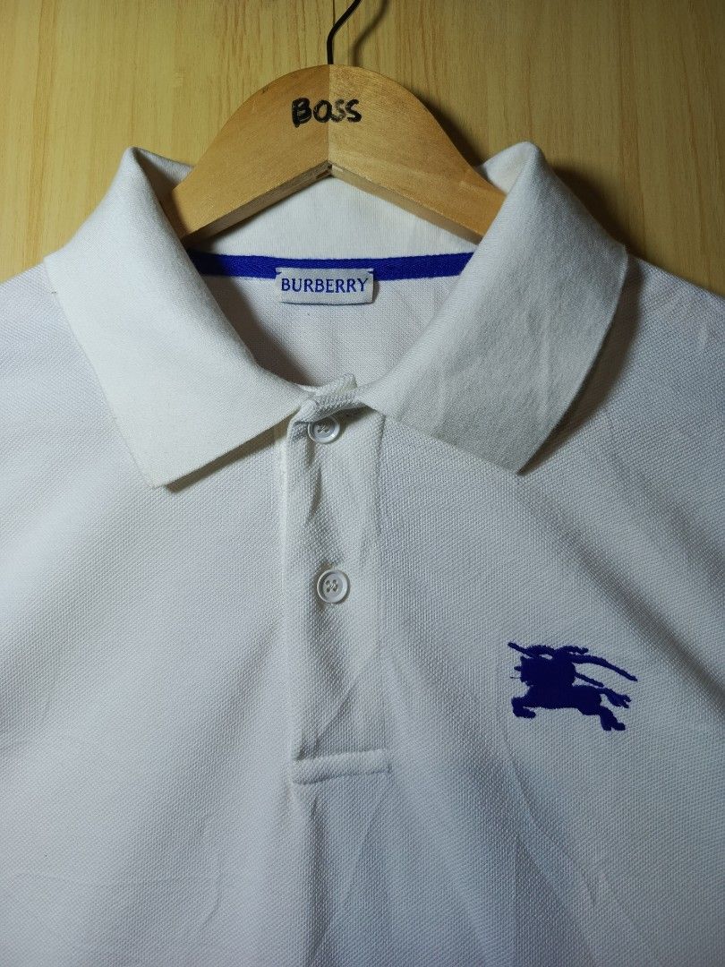 Burberry (EKD) (Category: Tshirts & Polo Shirts ) located in Andop. Submitted by loots.ni.ken (Listing ID 1468389375, Image 2). Description: Bur berry (EKD) 🔥 Dimes: W-21 L-27 Good as new Color rate: 10 No issue DM 📥.