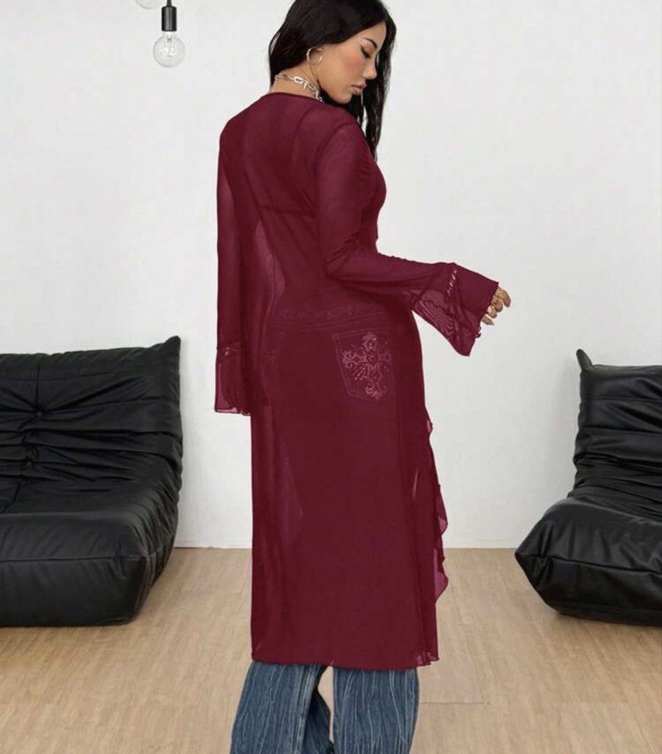 Burgundy Sheer Open Front Ruffle Cardigan (Category: Coats, Jackets and Outerwear) located in Quezon City. Submitted by gwy_preloved (Listing ID 1468302086, Image 2). Description: - Color: Rich burgundy - Style: Sheer long cardigan with open front - Details: Dual front tie closures with lovely ruffle trim on edges and cuffs - Sleeves: Long sleeves - Material: Lightweight, breathable mesh - Perfect Pairing: Looks amazing worn over flare jeans.
