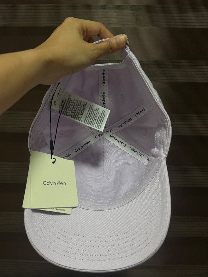 Calvin Klein Monogram Logo Cap-Lilac (Category: Activewear) located in Mandaluyong City. Submitted by shoppingmilesph (Listing ID 1468412668, Image 3). Description: 💜 Original & brand new Calvin Klein 💜Color: Light Lilac 💜 With original CK tags attached 💜 Large embroidered CK logo on the front panel and interior branded taping along the seams .