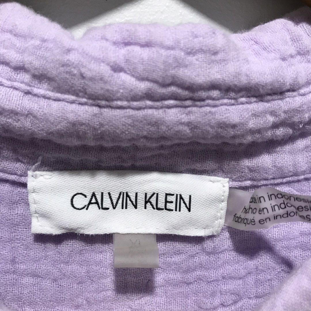CALVIN KLEIN Purple Button Down Longsleeve Polo (Category: Longsleeves) located in Cavite. Submitted by tanya.valentin (Listing ID 1468387959, Image 3). Description: - 26x31.