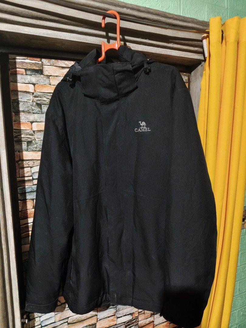 Camel Black Waterproof 3-in-1 Winter Jacket (Category: Coats, Jackets and Outerwear) located in Manila. Submitted by ericksongene.1118 (Listing ID 1468288097, Image 1). Description: - Brand/Model: Camel Waterproof Jacket - Color: Solid Black - 3-in-1 Design: Includes a detachable inner fleece liner for extra warmth - Weather Protection: Waterproof exterior with an adjustable hood and velcro cuffs - Storage: Secure zippered pockets for your essent
