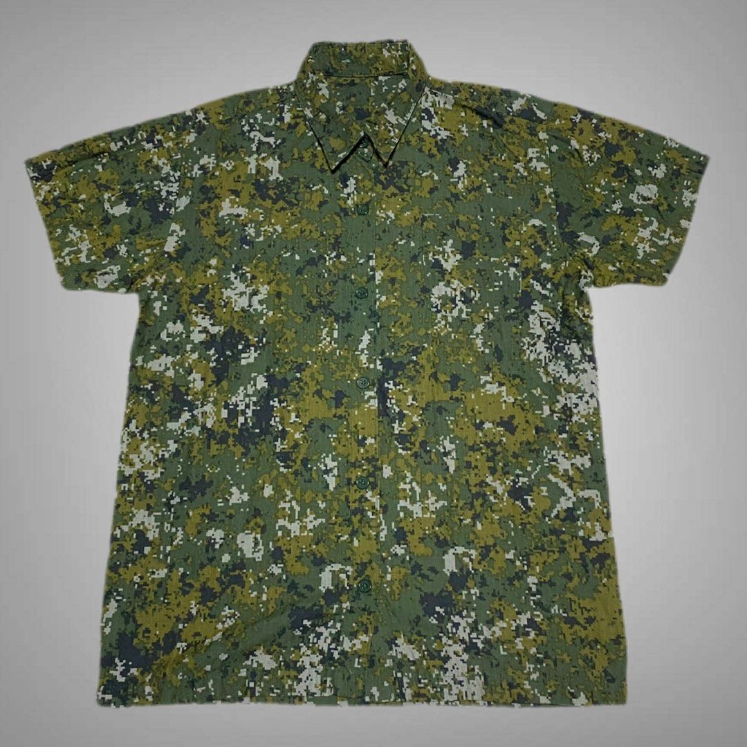 Camouflage Polo (Category: Formal Shirts) located in Mabalacat. Submitted by stellargarments (Listing ID 1468350630, Image 1). Description: pwede pang gift! Length : 25 Width : 20 Condition : 10/10 BAGONG BAGO! SUPER SOLID WITH Chest POCKET SUPER NICE & KINIS! VERY COMFY & SMOOTH ON SKIN NEED WASH NO MAJOR STAIN FRESH FROM BALE.