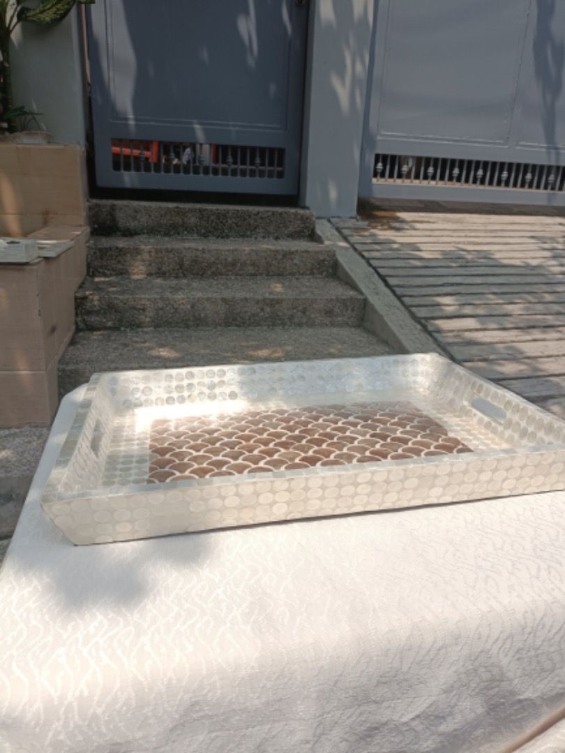 Capiz Shell Serving Tray (Category: Dinnerware & Cutlery) located in Taguig. Submitted by lumina.2026 (Listing ID 1468357040, Image 2). Description: - Type: Medium size 12"x17" - Material: Capiz shell, good lumber and resin for finished. - Features: Convenient cutout handles on two sides - Best for: Coffee table styling, home decor, or serving drinks. .
