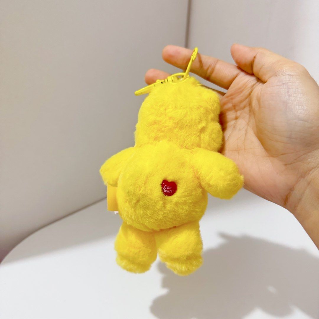 Care Bears Yellow Happy Sun Keychain Plush (Category: Plushies & Soft Toys) located in Manila. Submitted by ashyyel_ (Listing ID 1468479604, Image 2). Description: .