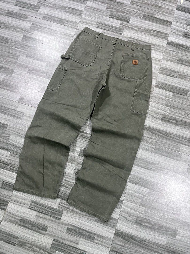 Carhartt Moss Green Carpenter Pants (Category: Jeans) located in Cavite. Submitted by arespichri90266 (Listing ID 1468425086, Image 1). Description: - size 38 - Moss Green dungaree fit - Naic Cavite Location .