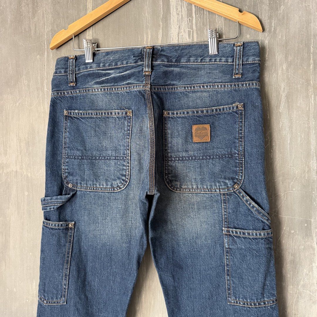 Carhartt WIP Heart Leather Patch Button-Fly Denim Carpenter Jeans (Category: Jeans) located in Puerto Princesa. Submitted by terdsthrift (Listing ID 1468392140, Image 2). Description: Carhartt WIP Heart Leather Patch Button-Fly Carpenter Jeans Waist: 32-34 Length: 41.5 Thigh: 11.5 Hem: 7.5 In Excellent Condition / No Issue Color Rate: 10/10 - Brand: Carhartt - Style: Carpenter jeans / Straight leg fit - Color/Wash: Classic blue with broken-in fad