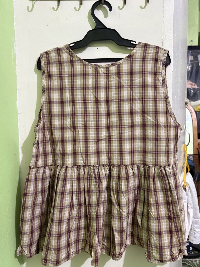 CAROLINE plaid sleeveless peplum top (Category: Sleeveless) located in Tanauan. Submitted by beebadooday (Listing ID 1468477455, Image 2). Description: - Brand: CAROLINE (Made in Seoul) - Style: Sleeveless top with round neckline and dropped waist gathered peplum hem - Fit: Loose and comfortable, ideal for warm weather.