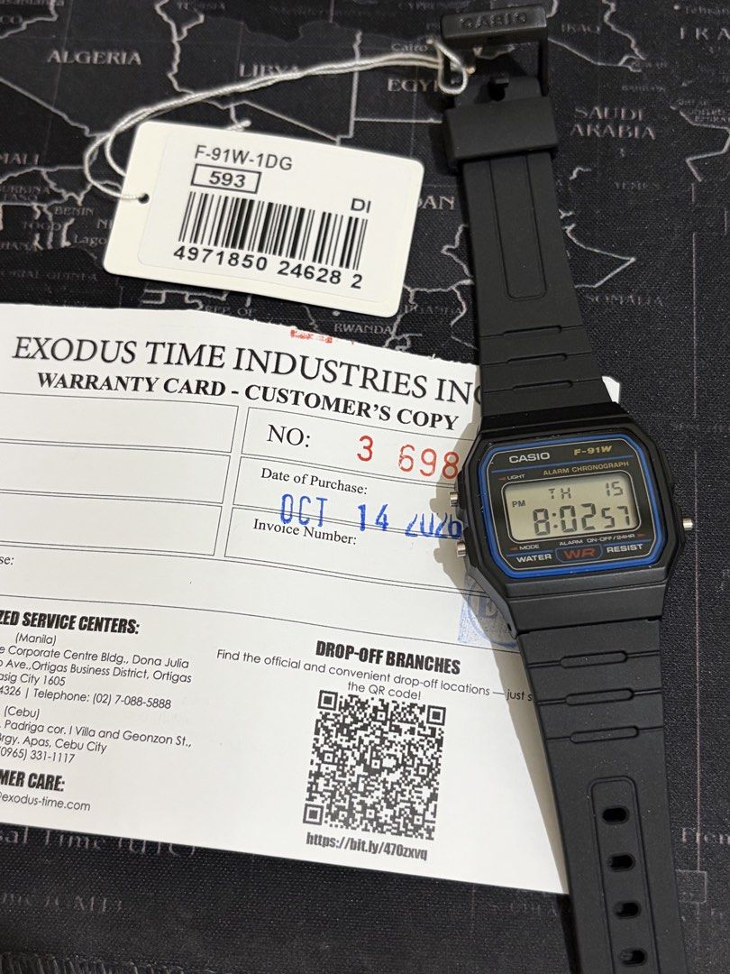 Casio F-91W Digital Watch (Category: Men's Watches) located in Taguig. Submitted by nivla23 (Listing ID 1468356100, Image 1). Description: Selling Casio F-91W - Brand: Classic Casio digital watch in black - Condition: Brand new, unworn, with original packaging and tag - Warranty: Includes warranty card dated October 14, 2026 - Design: Lightweight and comfortable resin strap with a clear digital display - Features: Built-in daily alarm and stopwat