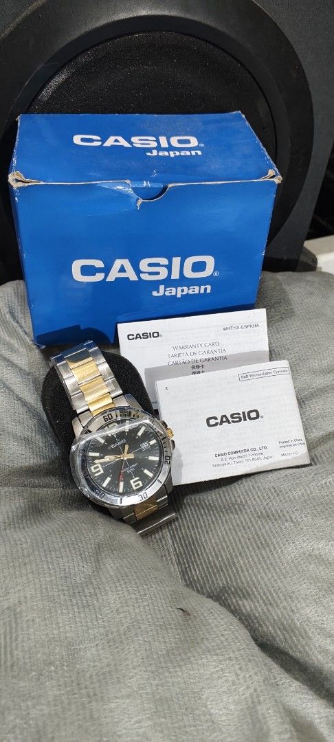 Casio MTP-VD01SG Two-Tone Watch (Category: Men's Watches) located in Manila. Submitted by burgerpatti (Listing ID 1468462168, Image 1). Description: - Brand: Casio MTP-VD01 Analog Watch - Design: Two-tone silver and gold stainless steel band with a sleek black dial - Features: Numeric markers at 6, 9, and 12, plus a convenient date window - Water Resistance: Up to 50 meters - Condition: Brand new with protective plastic film still wrapped around 