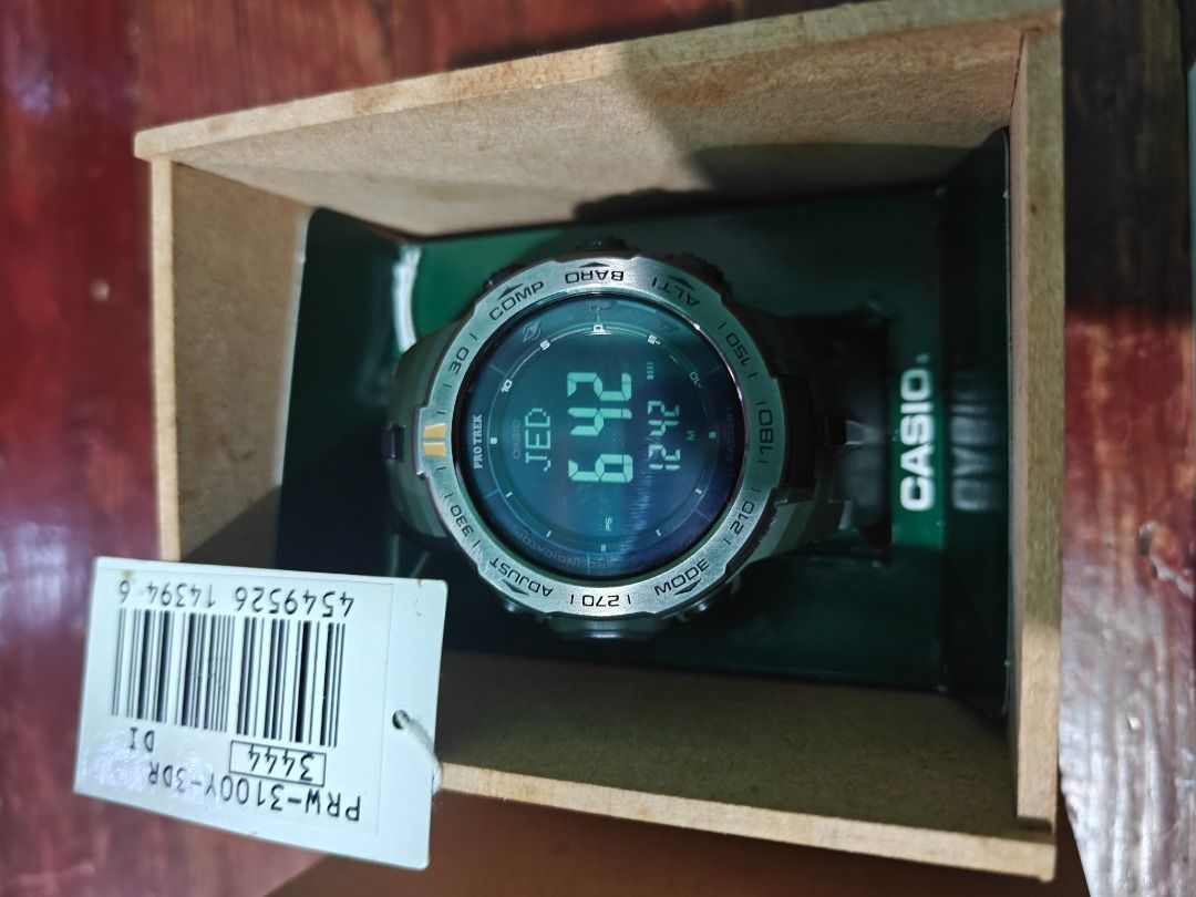 Casio Pro Trek PRW-3100Y-3DR Triple Sensor Watch (Category: Men's Watches) located in Caloocan City. Submitted by rannybuan316-34776 (Listing ID 1468439116, Image 2). Description: - Model: Casio Pro Trek PRW-3100Y-3DR (Green) - Condition: Brand new, unworn, and resting in original packaging - Power: Tough Solar (solar-powered) - Sensors: ABC sensors (Altimeter, Barometer, Compass) - Inclusions: Original wooden box, tag, and module 3444 user guide