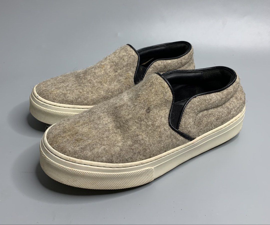 Celine Wool Felt Sneakers (Category: Shoe inserts) located in Binan City. Submitted by hybrid_archival_theory (Listing ID 1468461837, Image 2). Description: Celine Wool Felt Slip On Sneakers Womens Size- 36 In Good Condition •No Inclusions •Pair Only •No Incluisons Minimal Yellow part on the Wool Please Check Detailed Photos Posted For Your Reference Thankyou!!! •Celine Wool Felt Slip-On Sneakers with a textured brown/beige wool felt upper, black