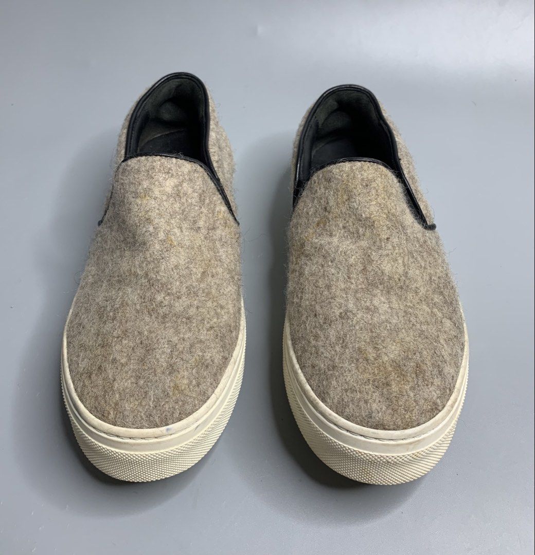 Celine Wool Felt Sneakers (Category: Shoe inserts) located in Binan City. Submitted by hybrid_archival_theory (Listing ID 1468461837, Image 3). Description: Celine Wool Felt Slip On Sneakers Womens Size- 36 In Good Condition •No Inclusions •Pair Only •No Incluisons Minimal Yellow part on the Wool Please Check Detailed Photos Posted For Your Reference Thankyou!!! •Celine Wool Felt Slip-On Sneakers with a textured brown/beige wool felt upper, black
