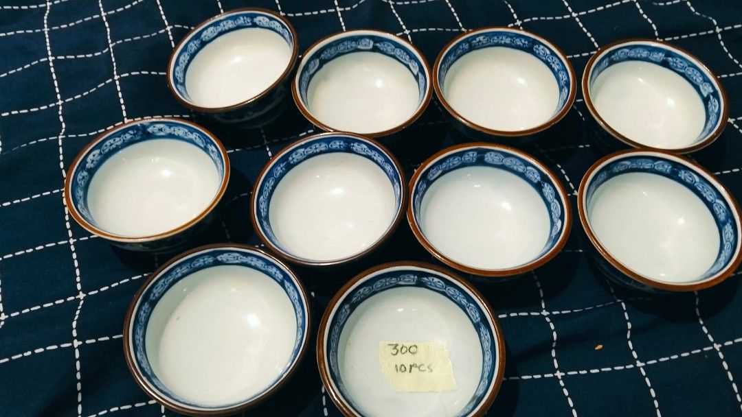 Ceramic Cups Bowls And Saucers Variety Sets (Category: Dinnerware & Cutlery) located in Manila. Submitted by msyhue11_ (Listing ID 1468491437, Image 3). Description: - Ceramic Tableware Sets for Sale - Available items and quantities: - 3x Adam & Eve cups (White embossed flower design) - 3x Bird saucers (Blue patterned) - 10x Blue rimmed small bowls - 5x Plain white bowls - 5x Grapevine pattern plates - Prices and piece counts clearly marked on ye
