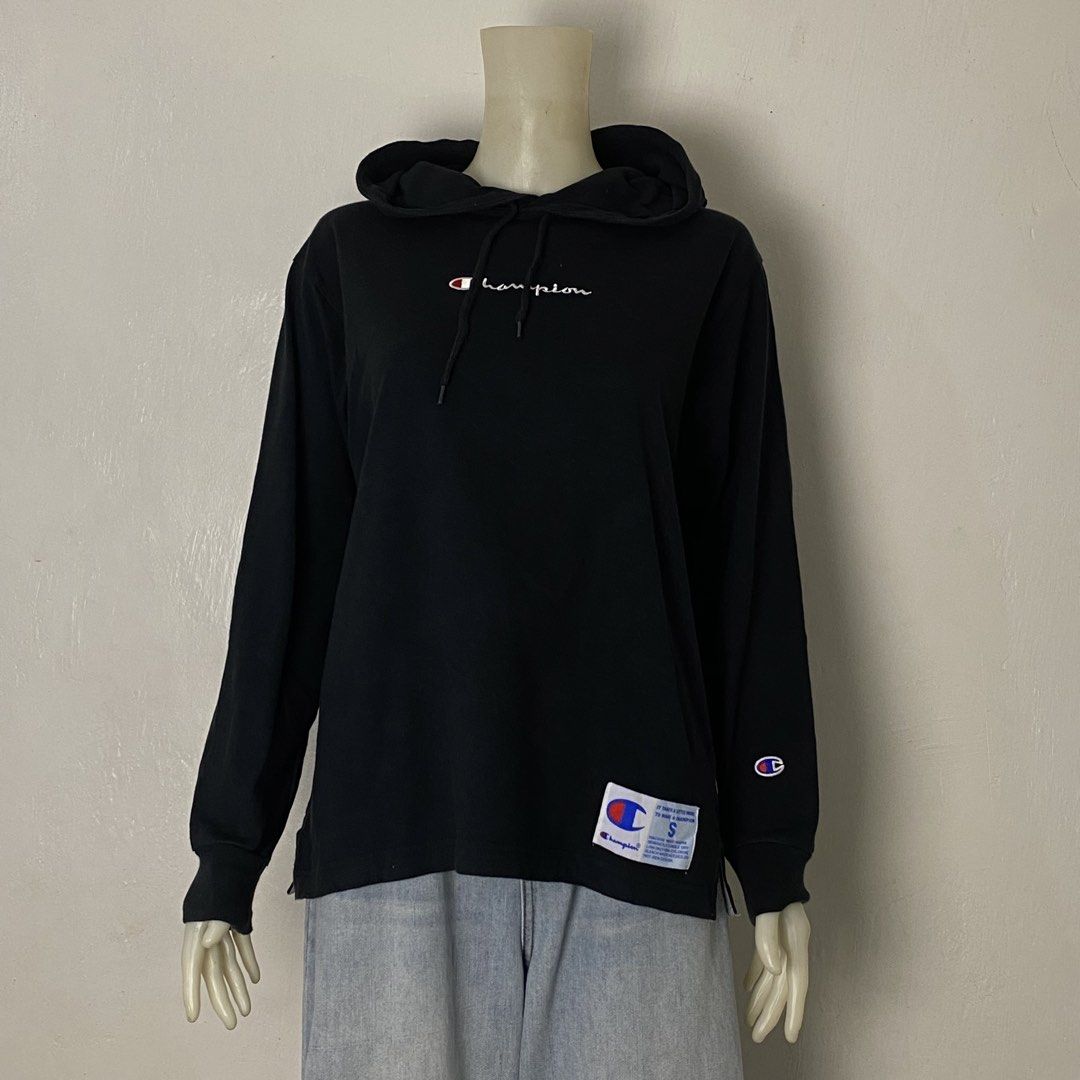 Champion ✨ | Black Hooded Pullover Sweatshirt (Category: Coats, Jackets and Outerwear) located in Bulacan. Submitted by orc.ph (Listing ID 1468398270, Image 2). Description: Champion ✨ | Black Hooded Pullover Sweatshirt Material Used: 100% Cotton - Black -Casual -Streetwear -Hem Side Slit -Ribbed Cuffs -Champion Spellout -Adjustable Hood Drawstring ‎-Size: L -Width: 21.5 ‎-Length: 25 ‎ ‎Pristine Condition. No Visible Flaws. Issue: NONE ‎ ‎⚠️Note: