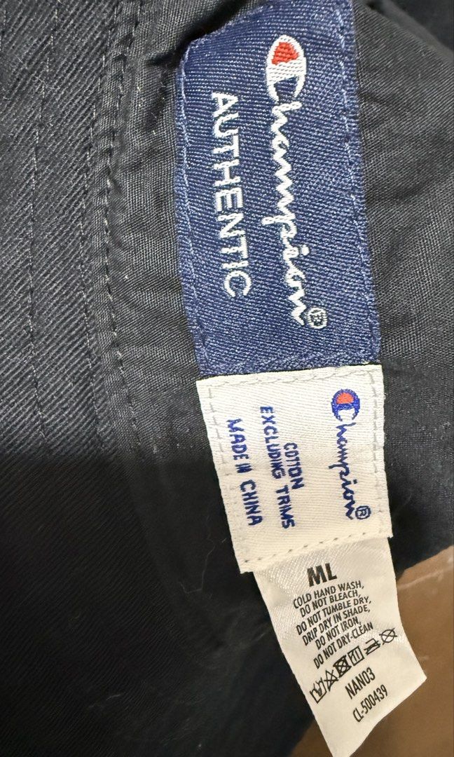 Champion Black Script Logo Bucket Hat (Category: Hats & Beanies) located in Naga. Submitted by tiindahunts (Listing ID 1468419064, Image 2). Description: From Dubai box! Can be unisex M-L.