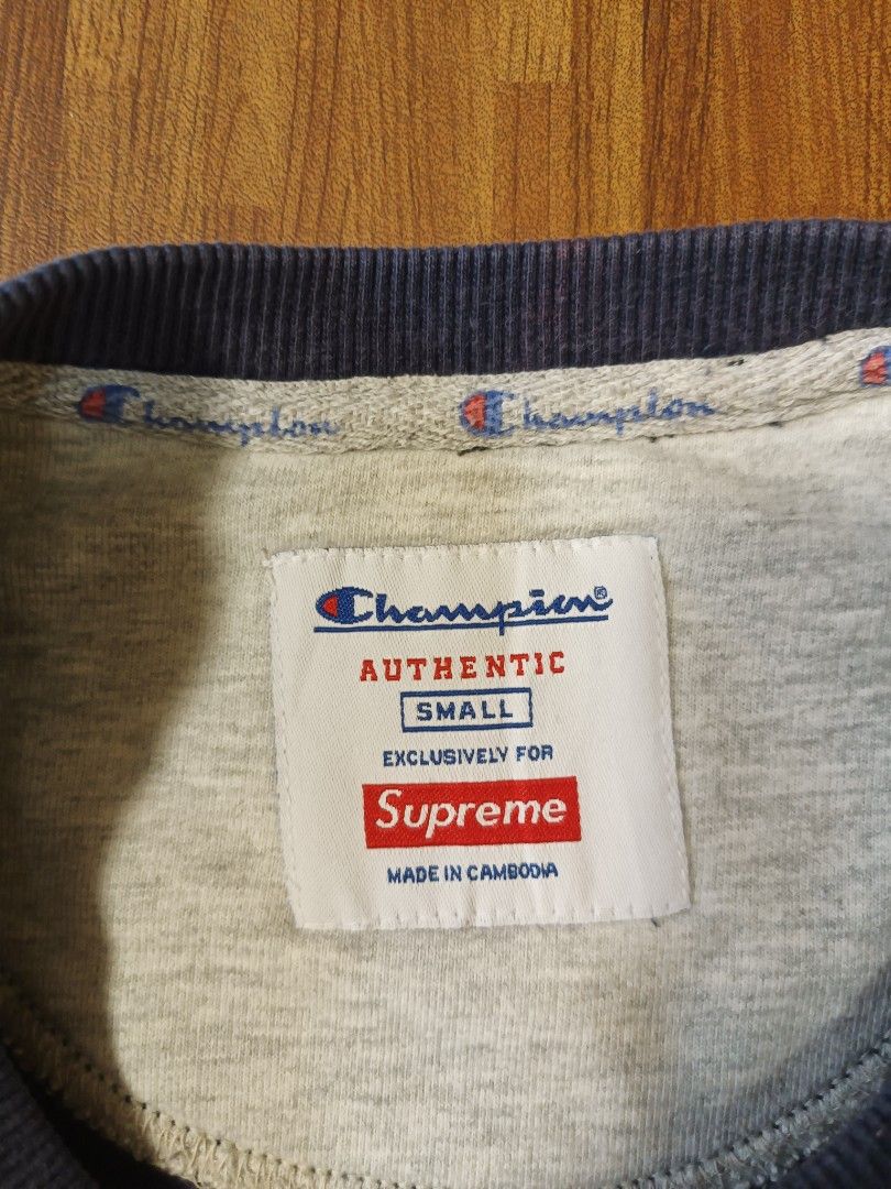 Champion Crewneck Sweatshirt (Category: Coats, Jackets and Outerwear) located in Cavite. Submitted by south.loot (Listing ID 1468336456, Image 2). Description: Champion x Supreme Crewneck Size Small Length 26.5 Width 23 Color rate 8.5/10 Crackprints Good to excellent condition.