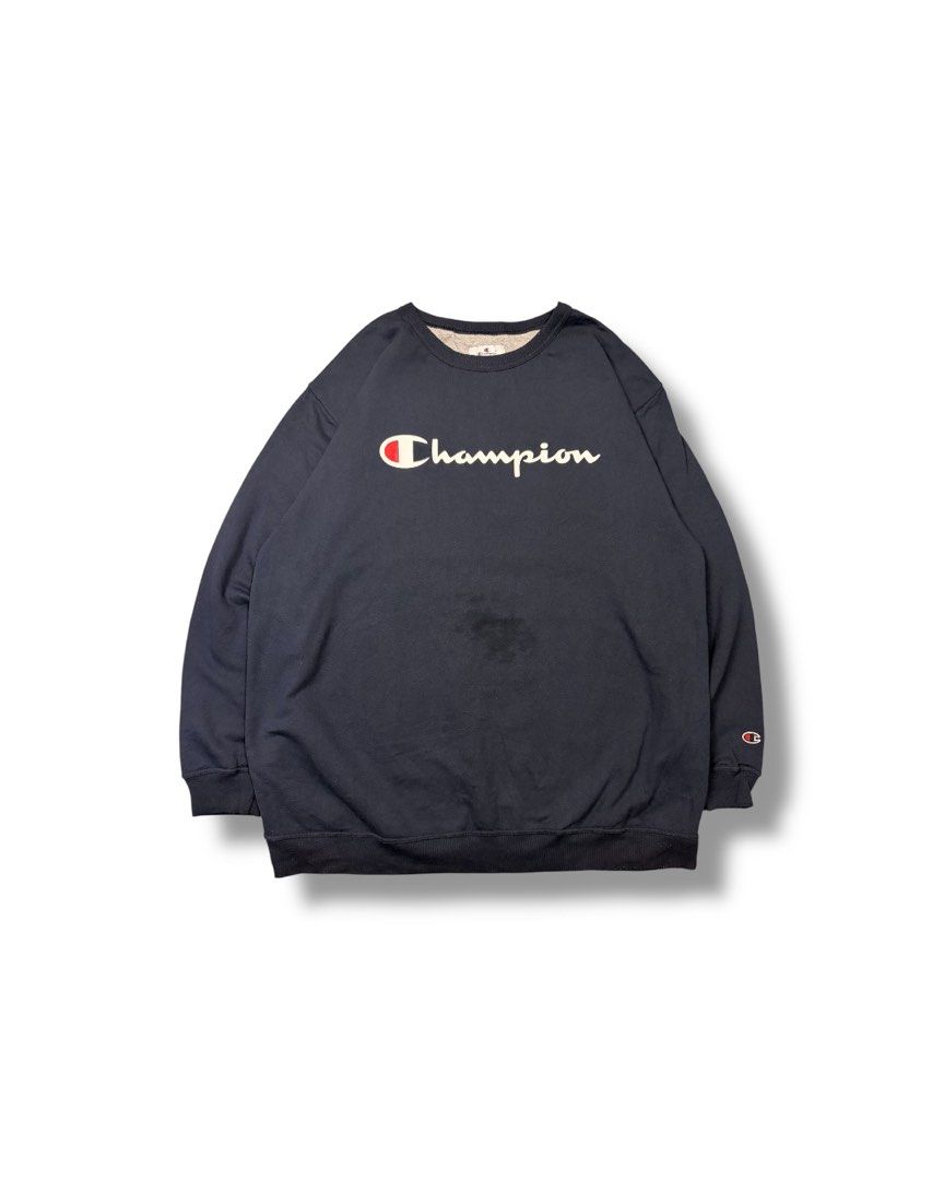Champion Dark Navy Script Logo Crewneck Sweatshirt (Category: Coats, Jackets and Outerwear) located in Cainta. Submitted by rizalthriftstuff (Listing ID 1468368756, Image 1). Description: Champ Script Navy Blue Dimes Size: 3XL Tall Width: 28 Length: 34 Color Rate: 9 Condition: 8 Issue: Oil Stain Mine - ₱400 - Brand/Style: Champion crewneck sweatshirt - Color: Dark navy with large cream script logo - Details: Classic embroidered C logo patch on le
