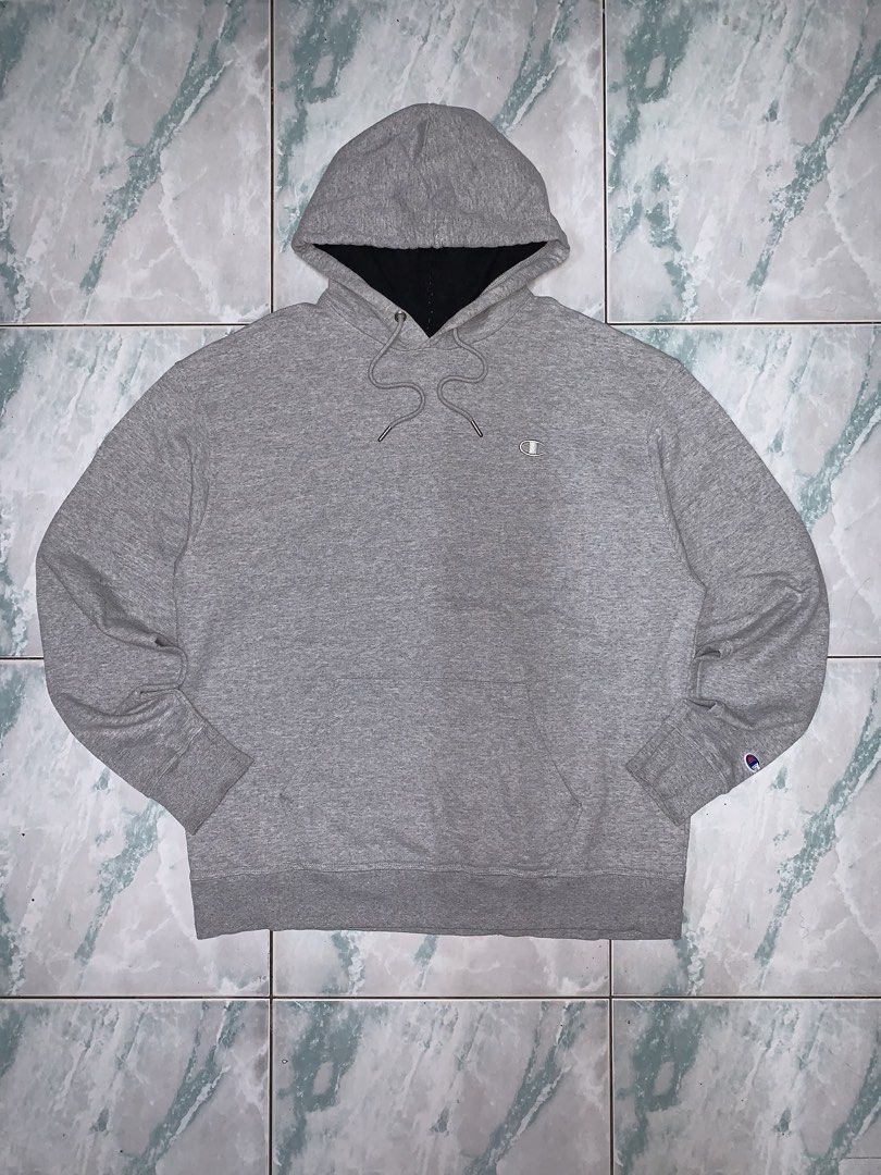 Champion pullover hoodie (Category: Hoodies) located in Pasig City. Submitted by thriftnflip1600 (Listing ID 1468461762, Image 1). Description: XL on tag Width: 25.5” Length: 29.5” Color rate: 9/10 Condition: 9/10 No issues.