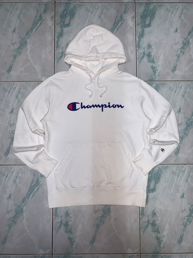 Champion pullover hoodie (Category: Hoodies) located in Pasig City. Submitted by thriftnflip1600 (Listing ID 1468461972, Image 1). Description: L on tag Width: 20.5” Length: 26” Color rate: 9/10 Condition: 9/10 No issues.