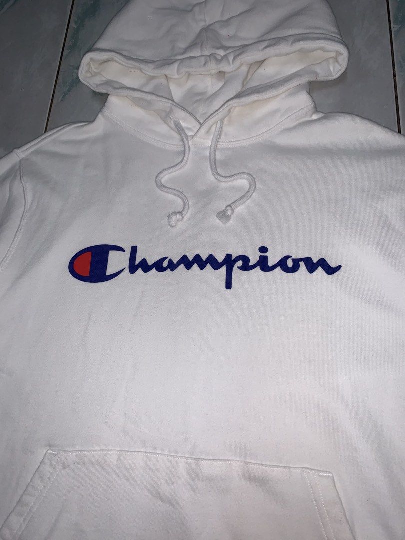 Champion pullover hoodie (Category: Hoodies) located in Pasig City. Submitted by thriftnflip1600 (Listing ID 1468461972, Image 2). Description: L on tag Width: 20.5” Length: 26” Color rate: 9/10 Condition: 9/10 No issues.
