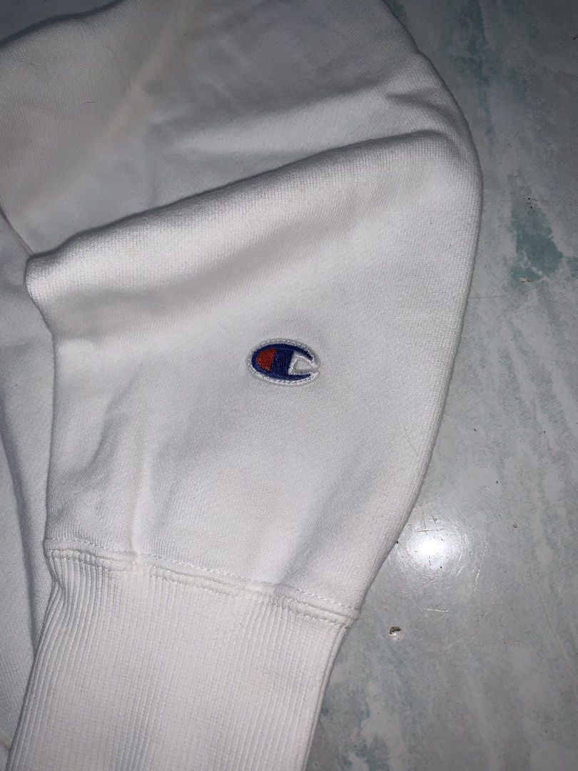 Champion pullover hoodie (Category: Hoodies) located in Pasig City. Submitted by thriftnflip1600 (Listing ID 1468462384, Image 3). Description: L on tag Width: 20.5” Length: 26” Color rate: 9/10 Condition: 9/10 No issues.