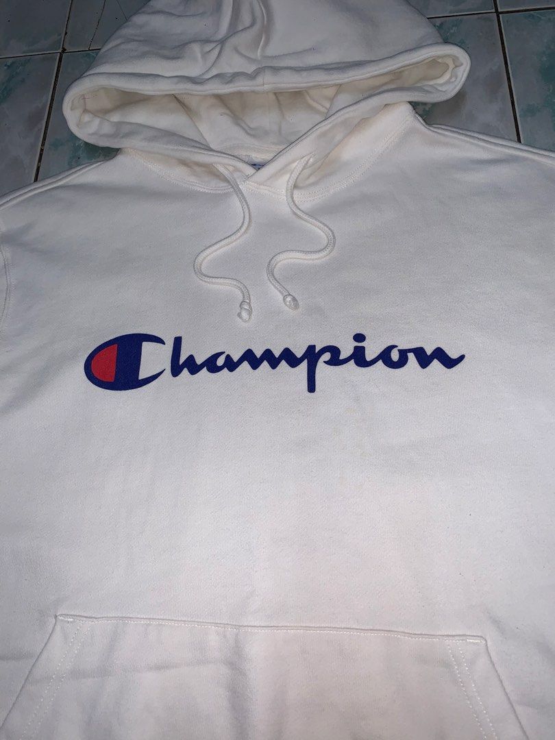 Champion pullover hoodie (Category: Hoodies) located in Pasig City. Submitted by thriftnflip1600 (Listing ID 1468462384, Image 2). Description: L on tag Width: 20.5” Length: 26” Color rate: 9/10 Condition: 9/10 No issues.