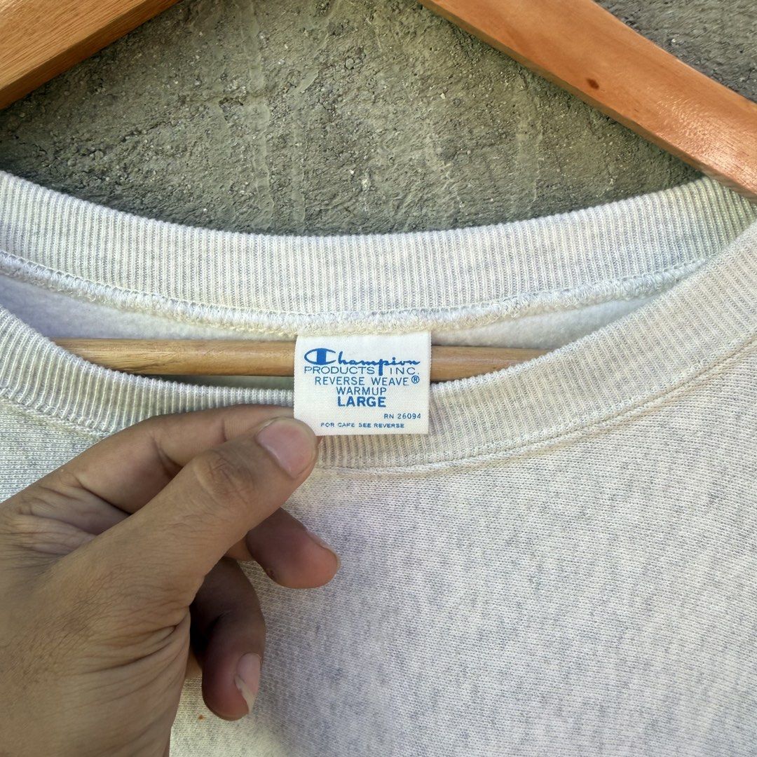 Champion Reverse Weave Warmup Sweatshirt Grey Large (Category: Coats, Jackets and Outerwear) located in Caloocan City. Submitted by ayogorenia1002 (Listing ID 1468350940, Image 3). Description: - Brand: Champion Reverse Weave - Style: Classic crewneck warmup sweatshirt / pullover - Color: Heather Grey - Size: Large - Material: Premium heavyweight cotton blend - Details: Embroidered Champion chest logo and iconic sleeve cuff patch - Origin: Made i