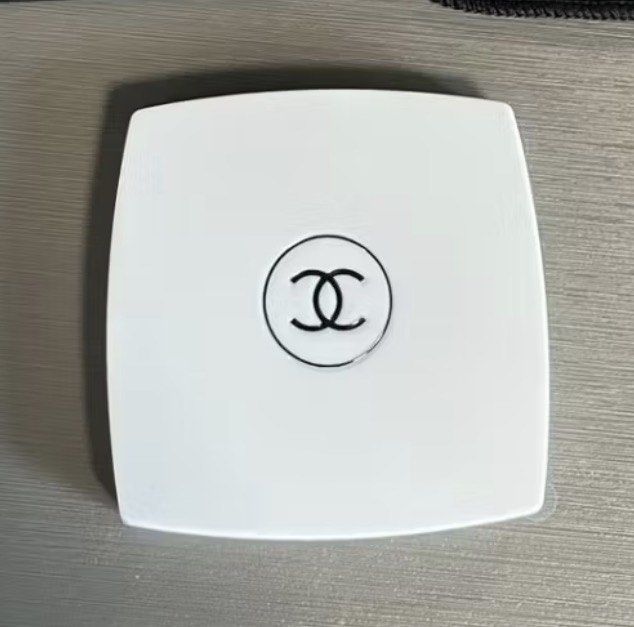 CHANEL compact mirror (Category: Makeup) located in Tanza. Submitted by ilovediyour (Listing ID 1468336552, Image 2). Description: High quality 3D Logo — good for gifting Paper bag +120php For those only willing to wait. 7-10 days eta~.