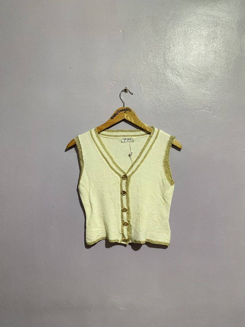 Chanel Gold Design Sleeveless Top (Category: Sleeveless) located in Angeles City. Submitted by andreiboughts (Listing ID 1468416559, Image 1). Description: Length: 17 Width: 15 Condition: 10/10 Color rate: 10/10 Issue (s): removable stain Part of Hangtag is still intact Complete Tags ✅.