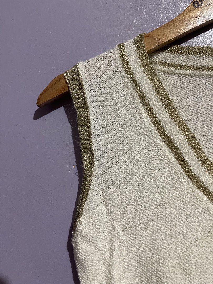 Chanel Gold Design Sleeveless Top (Category: Sleeveless) located in Angeles City. Submitted by andreiboughts (Listing ID 1468416559, Image 3). Description: Length: 17 Width: 15 Condition: 10/10 Color rate: 10/10 Issue (s): removable stain Part of Hangtag is still intact Complete Tags ✅.
