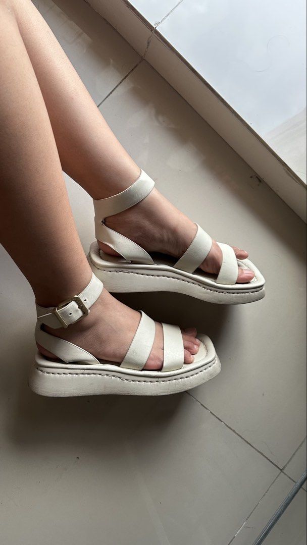 Charles and Keith white platforms (Category: Wedges) located in Manila. Submitted by nabistudioo (Listing ID 1468291295, Image 2). Description: Bought in Charles and Keith. Taga Zara H&M Shein Charles and Keith Pedro Alberto Hue Label Rusty Lopez.
