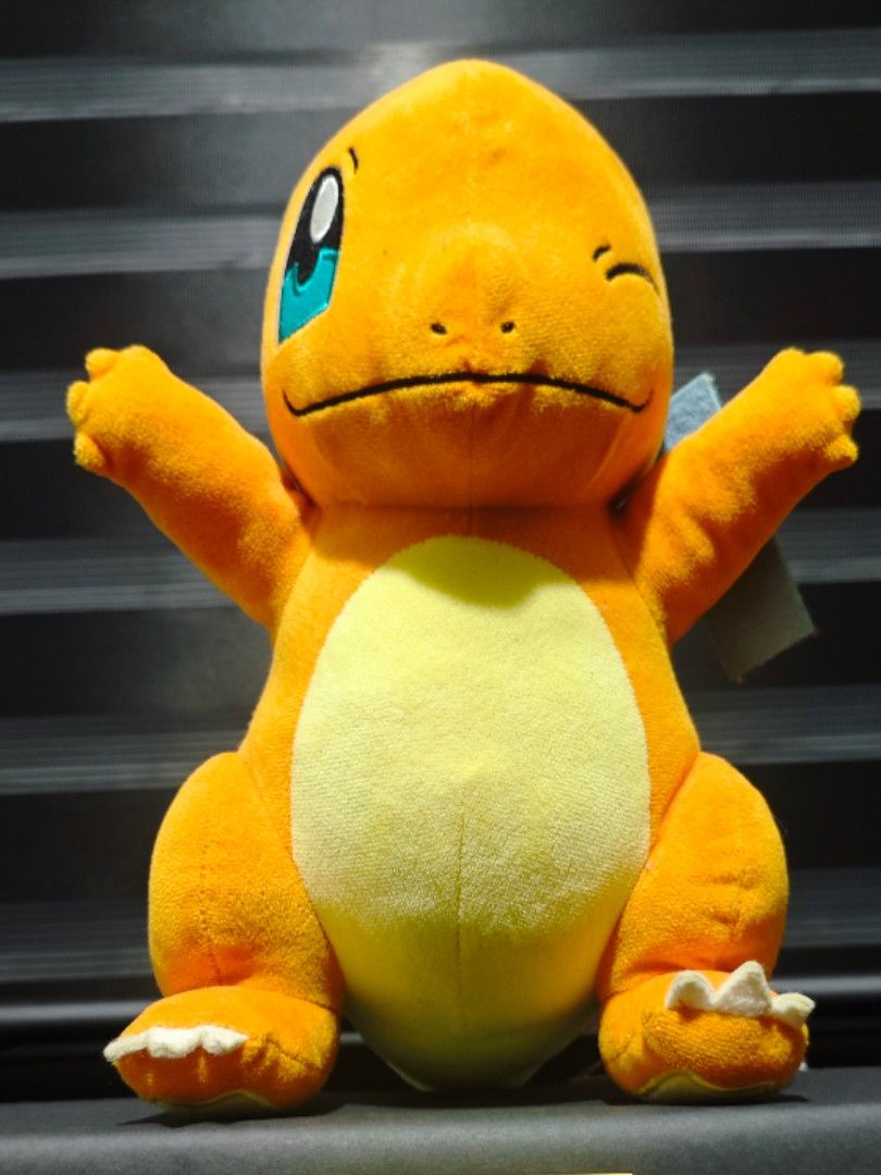 Charmander Pokemon Plush Toy Winking Face (Category: Plushies & Soft Toys) located in Obando. Submitted by welhaseyo (Listing ID 1468439338, Image 1). Description: Got from Japan trip, lucky draw.