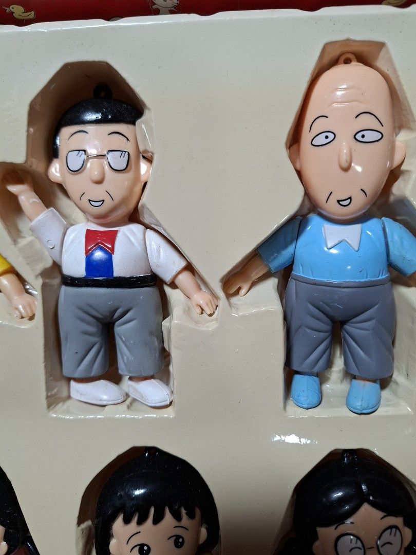 Chibi Maruko-chan Character Figurine Set with Original Box (Category: Designer & Blind Box Toys) located in Baguio. Submitted by restyrille77846 (Listing ID 1468345443, Image 3). Description: - Complete Chibi Maruko-chan figurine set including Maruko, family members, and classmates - Each figure comes with a convenient hanging loop on top - Figures are brand new and intact inside their original plastic tray - Please note: Outer cardboard box show