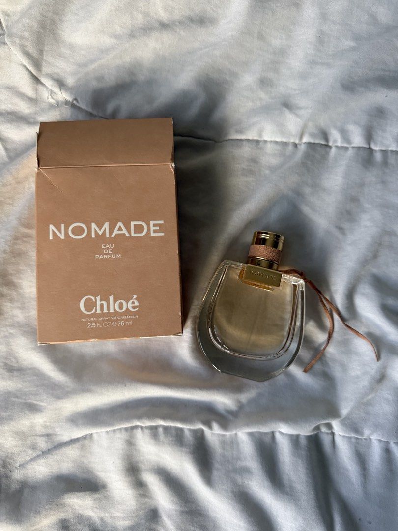 Chloé Nomade Eau de Parfum 75ml (Category: Fragrance & Deodorants) located in Batangas. Submitted by gaprelovedthings (Listing ID 1468359999, Image 1). Description: - Authentic Chloé Nomade Eau de Parfum - Size: 75ml (Natural Spray / Vaporisateur) - Condition: Mostly full, only sprayed a few times - Packaging: Comes with original box (minor shelf wear on top flap) - Fragrance Profile: Fresh, woody floral with oakmoss and plum notes - Perfect as a