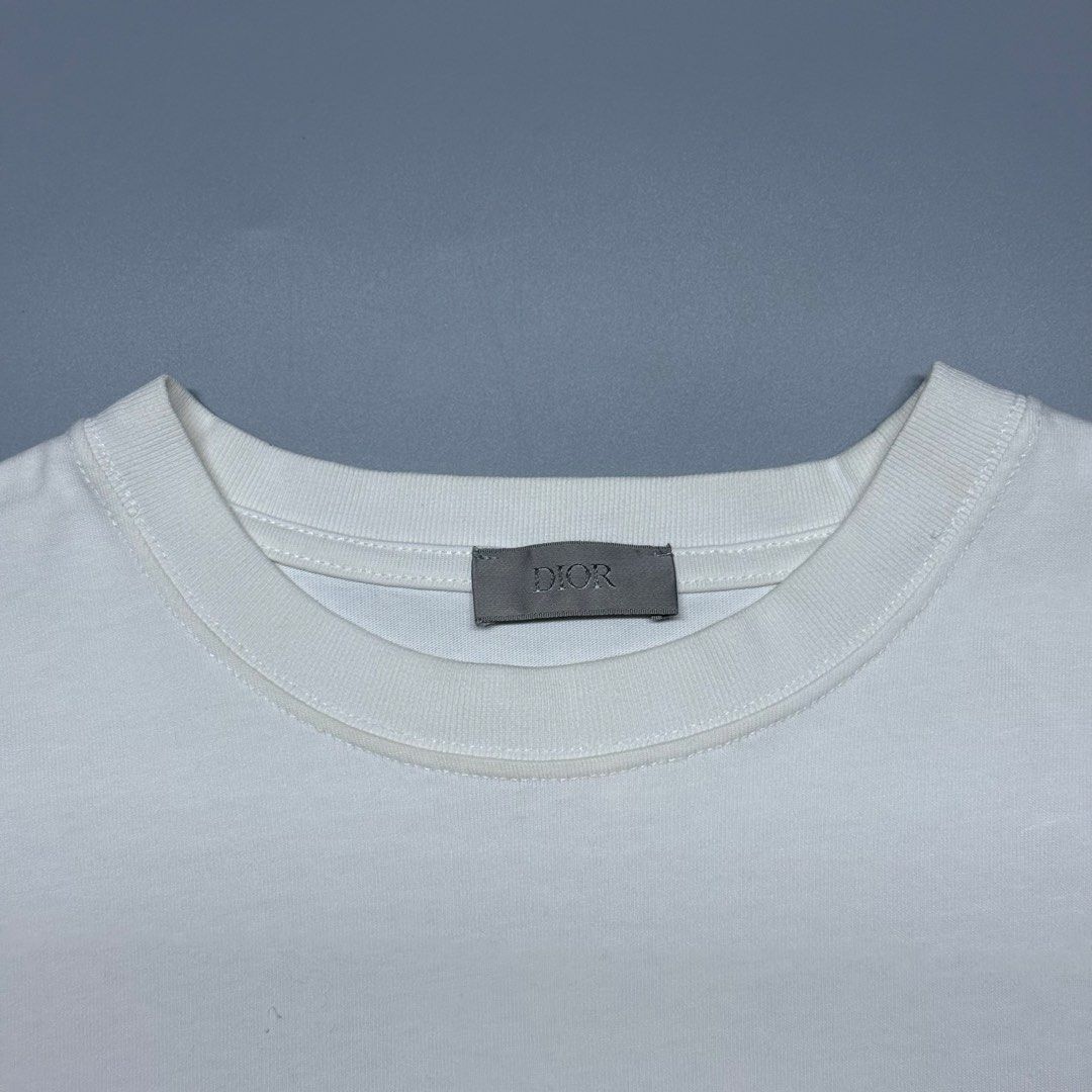 Christian Dior Couture Embroidered Logo (Category: Luxury Apparel) located in Kabacan. Submitted by rags2penny.phl (Listing ID 1468335862, Image 3). Description: - Dior short sleeve t-shirt in crisp white - Features a subtle neon green Christian Dior Couture embroidery on the chest - Classic ribbed crewneck collar with signature grey Dior neck tag - Clean solid cotton body with a straight hem - Premium designer casual wear - Condition: Brand new 