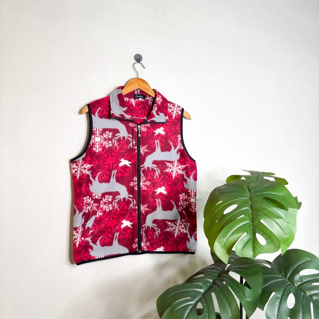 Christmas (Dindin) | Vest. (Category: Vests) located in Manila. Submitted by bypiecesandstories (Listing ID 1468323759, Image 1). Description: Christmas (Dindin) | Vest. 699 PHP 🧡 Perfect Condition Can Fit — Small to Large Dimensions — W 22" L 25" A red and white Christmas vest featuring an all-over festive pattern. An easy layering piece that adds a playful holiday touch. • REMINDERS • — Read the Rules & Guidelines under FAQS. — First to commen