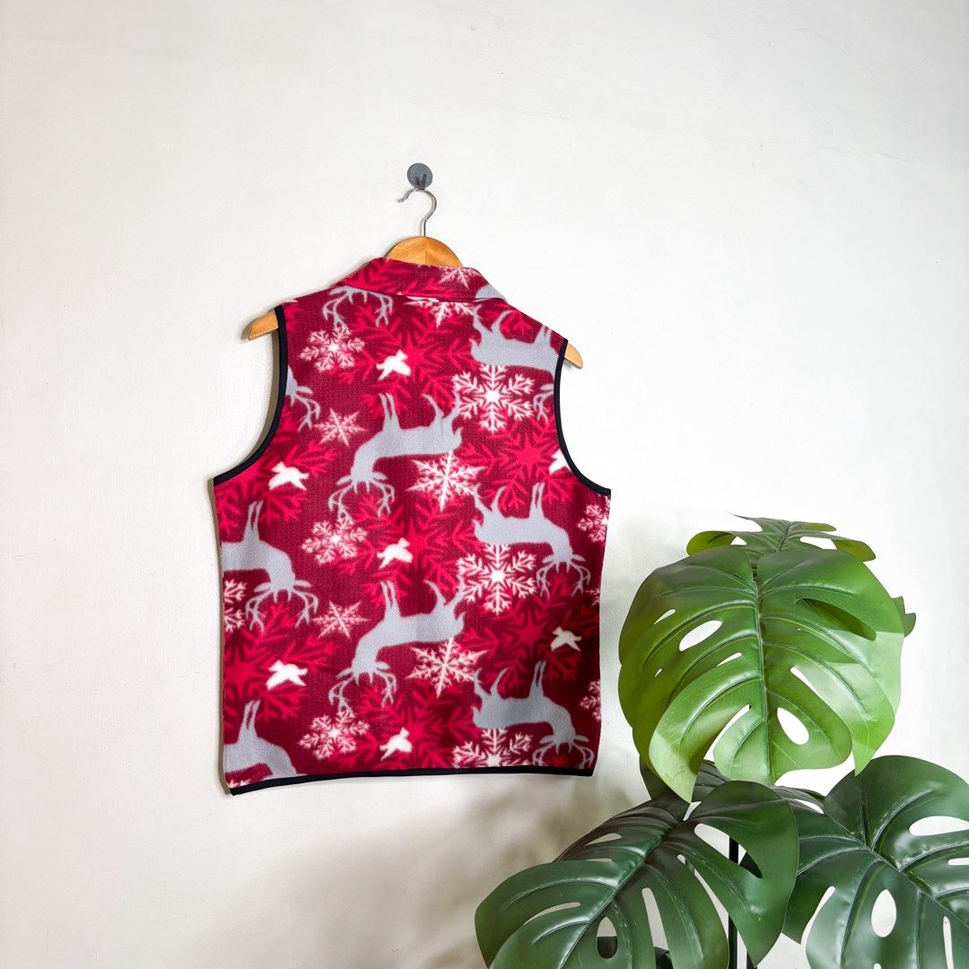 Christmas (Dindin) | Vest. (Category: Vests) located in Manila. Submitted by bypiecesandstories (Listing ID 1468323759, Image 2). Description: Christmas (Dindin) | Vest. 699 PHP 🧡 Perfect Condition Can Fit — Small to Large Dimensions — W 22" L 25" A red and white Christmas vest featuring an all-over festive pattern. An easy layering piece that adds a playful holiday touch. • REMINDERS • — Read the Rules & Guidelines under FAQS. — First to commen