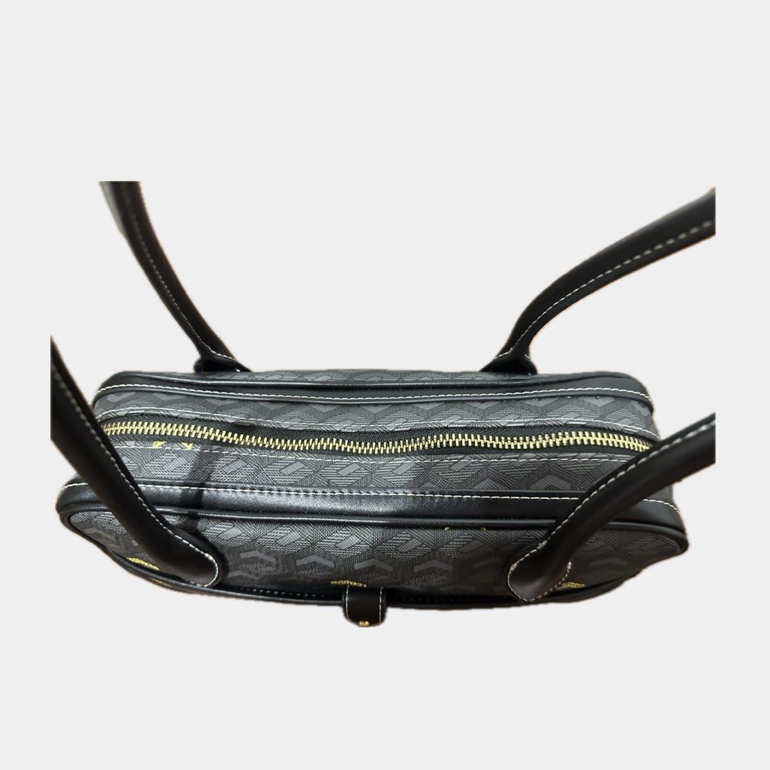 Christy Ng marcelo shoulder bag in Black [version 2] (Category: Shoulder Bags) located in Paranaque City. Submitted by annvzsn (Listing ID 1468499172, Image 3). Description: Color: black Size: 10.5" (L) x 5" (H) x 3.5" (W) Material: vegan leather Bought in: PH (official website) Condition: like new Details: - Version 2 - Oblong shape sized - Coated canvas, vegan leather, and other materials - Gold zipper closure Inclusions: - Original dust bag ♡ 