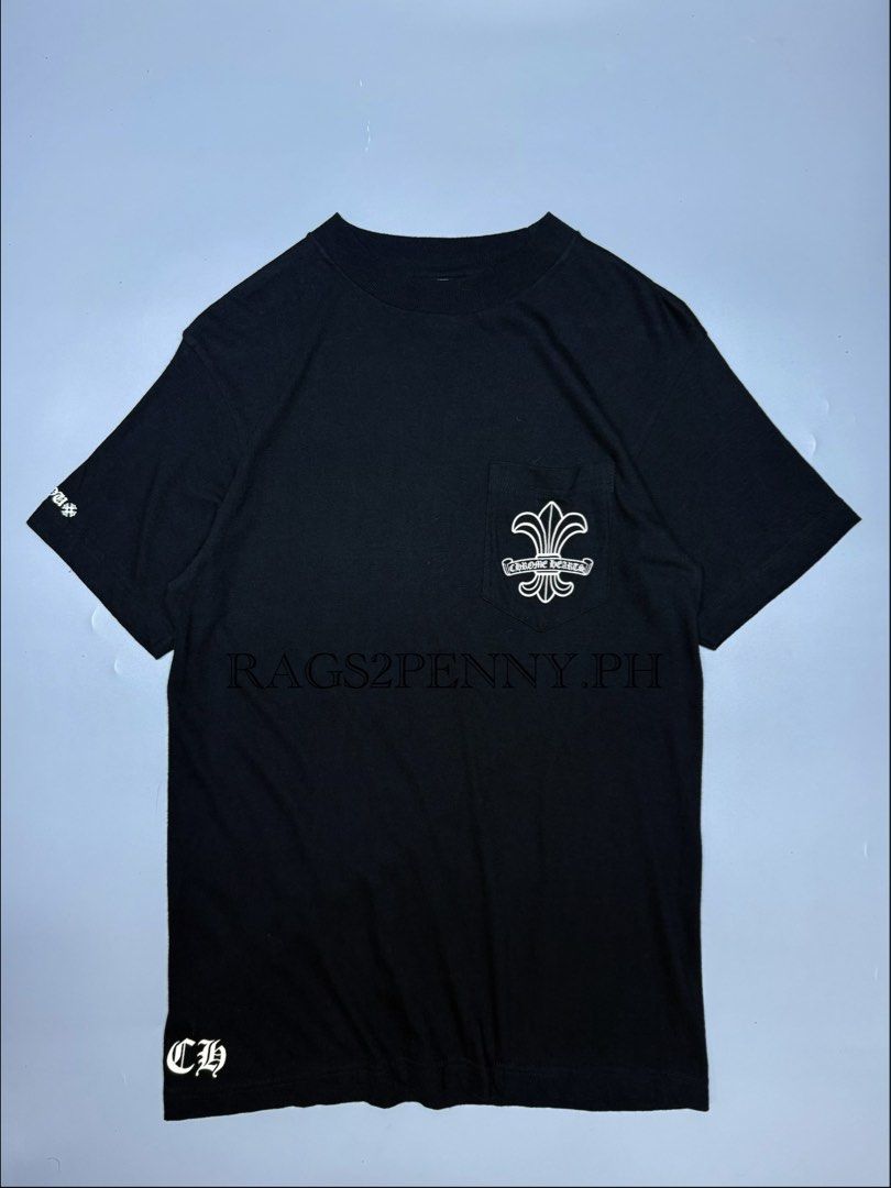 Chrome Hearts Fleur-De-Lis Pocket T-Shirt (Category: Tshirts & Polo Shirts ) located in Kabacan. Submitted by rags2penny.phl (Listing ID 1468339799, Image 1). Description: - Brand: Chrome Hearts - Size: Medium (Made in USA, RN 95024 tags intact) - Color: Solid black cotton with crisp white prints - Front: Chest pocket with white fleur-de-lis print - Back: Large matching fleur-de-lis graphic with smaller motifs - Details: Signature typography prin
