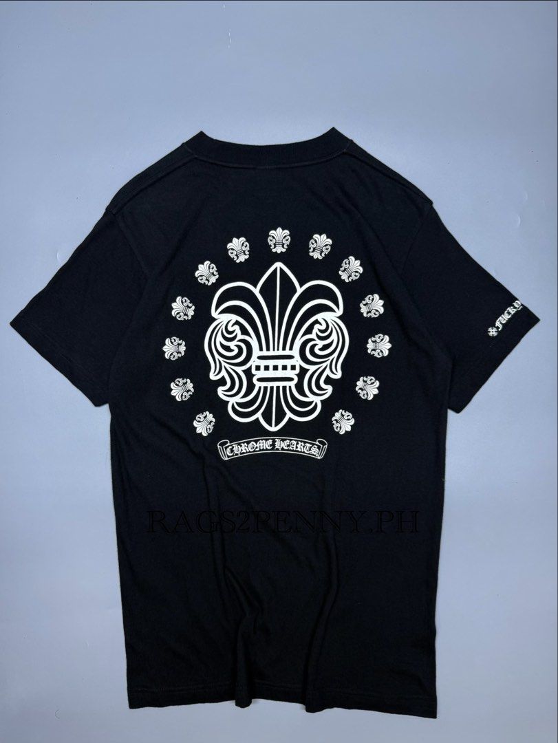 Chrome Hearts Fleur-De-Lis Pocket T-Shirt (Category: Tshirts & Polo Shirts ) located in Kabacan. Submitted by rags2penny.phl (Listing ID 1468339799, Image 2). Description: - Brand: Chrome Hearts - Size: Medium (Made in USA, RN 95024 tags intact) - Color: Solid black cotton with crisp white prints - Front: Chest pocket with white fleur-de-lis print - Back: Large matching fleur-de-lis graphic with smaller motifs - Details: Signature typography prin