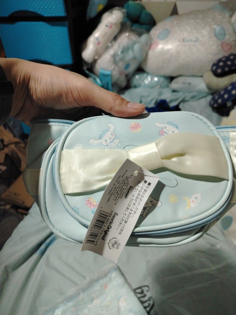 Cinnamoroll Cosmetic pouch combo (Category: Purses & Pouches) located in Manila. Submitted by joycechua439850 (Listing ID 1468299606, Image 2). Description: -Round and flat 2-in-one cosmetic pouch combo -Authentic Sanrio Japan Brand in original packaging -Soft pastel Blue color that feels elegant and chic at the same time -Perfect for gifts and collection.