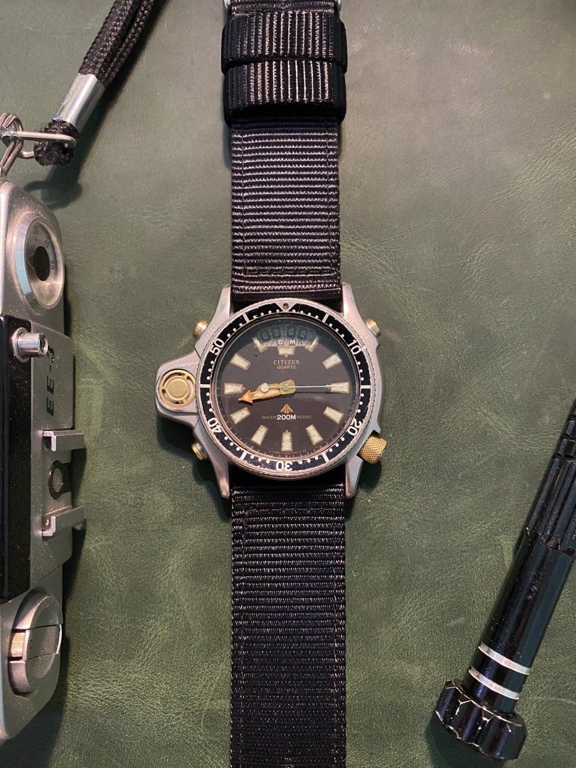 Citizen aqualand first gen (Category: Men's Watches) located in Cebu City. Submitted by unoverse_vntg (Listing ID 1468292458, Image 2). Description: Citizen aqualand First gen C022-088093 Working perfect Digital and analogue All buttons functions All original head Nato strap.