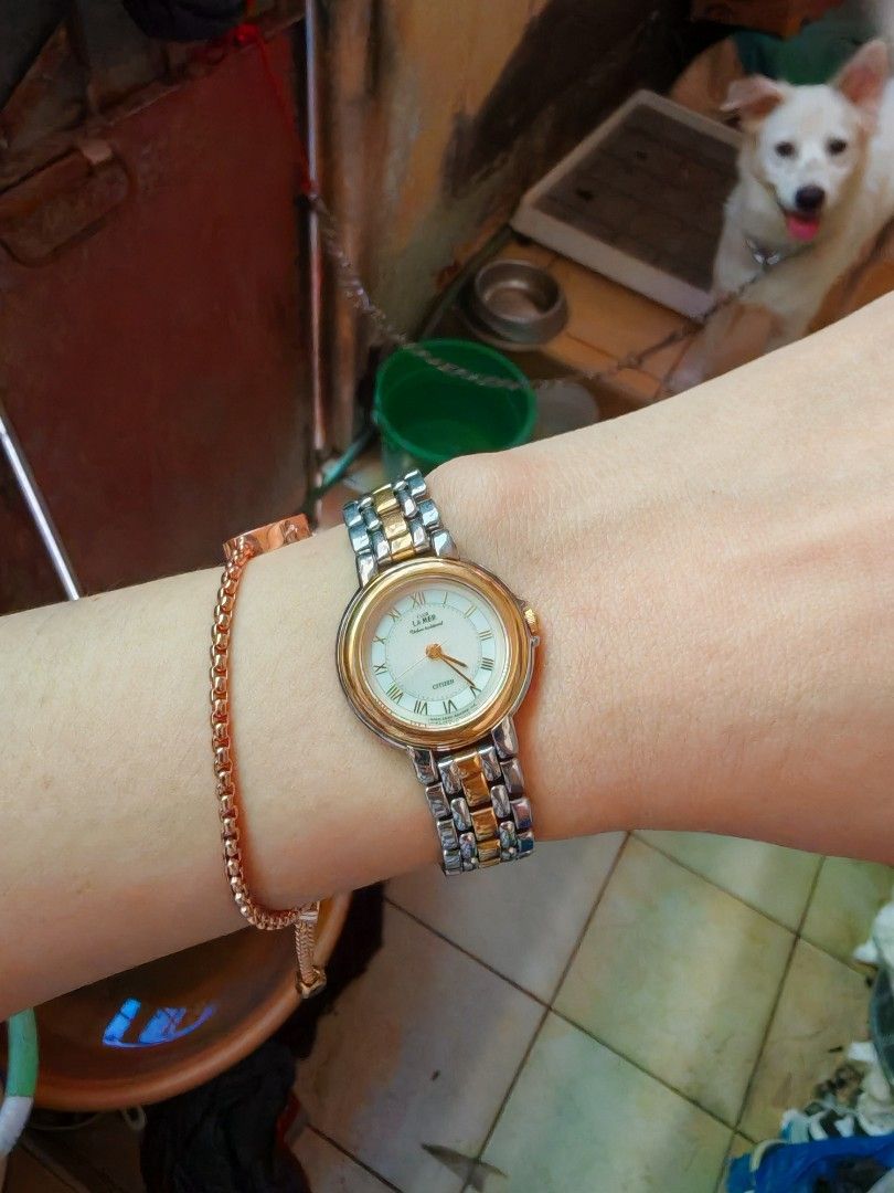 Citizen Club La Mer Two-Tone Watch (Category: Women's Watches) located in Taguig. Submitted by mystuff4youph (Listing ID 1468366111, Image 2). Description: - Brand: Citizen Club La Mer - Type: Women's classic dress wristwatch - Design: Two-tone silver and gold metal strap - Dial: White dial with elegant Roman numerals - Case: Round base metal case with model numbers stamped on the back - Features: Water resistant - Condition: Works fine, with bat