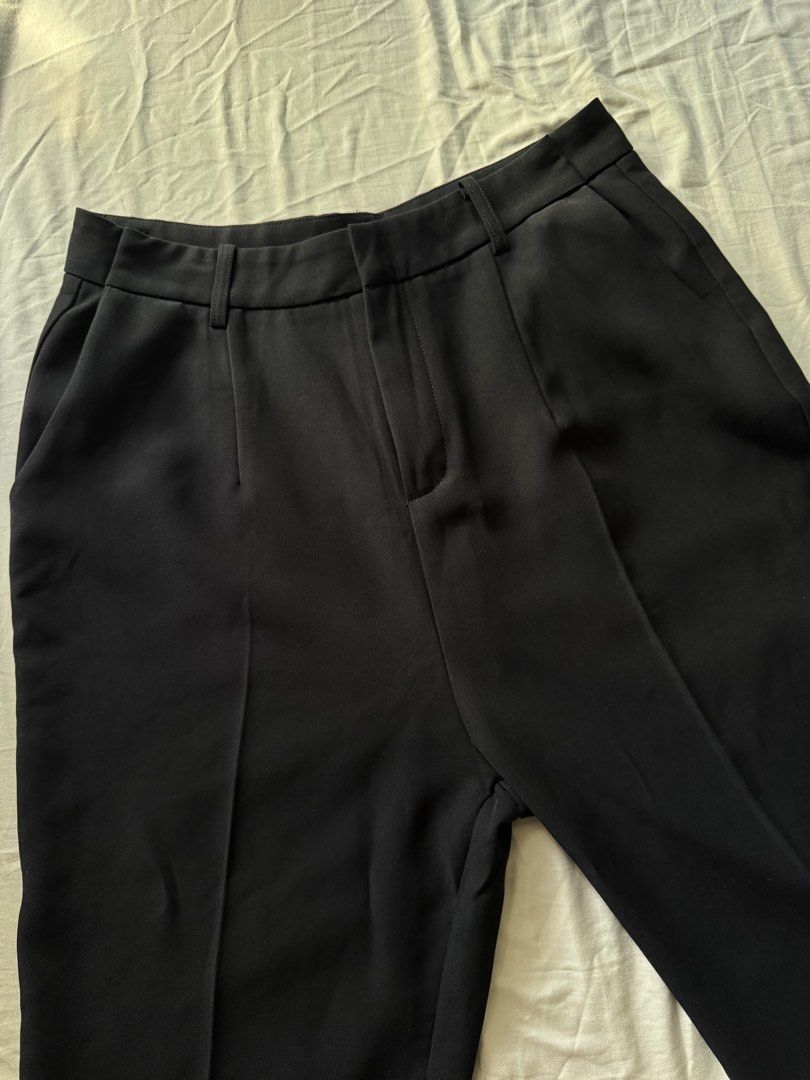 Classic Black Trousers High Waist Tailored Pants (Category: Jeans) located in Mandaluyong City. Submitted by uol77 (Listing ID 1468340702, Image 1). Description: - Color: Black -Length 36inches -Waist 29-30inches - Fit: High waist, straight leg cut - Details: Front pleats, belt loops, sharp front creases, and neat cuff stitching - Pockets: Deep functional side pockets - Style: Versatile for workwear or smart casual looks.