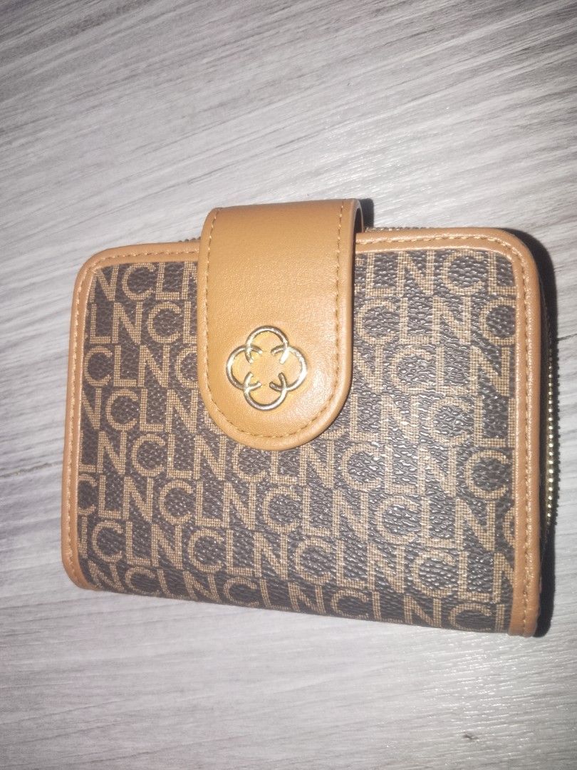 CLN Kathie wallet (Category: Wallets & Card holders) located in Las Pinas. Submitted by ashierams (Listing ID 1468312576, Image 2). Description: (No zipper) good as new in the color Coffee Classic.