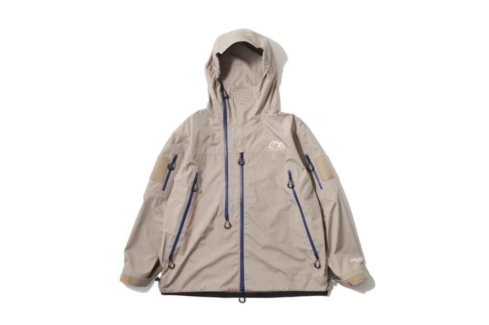 CMF Outdoor Garment Pull Shell Coexist (Greige Limited edition colorway) (Category: Coats, Jackets and Outerwear) located in Angeles City. Submitted by dripyco. (Listing ID 1468244790, Image 2). Description: Dimes: Small on size good for 5'5/5'9 height ment 24-25 Width flexi 26-28 Length flexi Key Design Features • Dual-Access Zips: Features distinctive vertical, multi-pull navy blue zippers on the torso for seamless access to multiple interior a